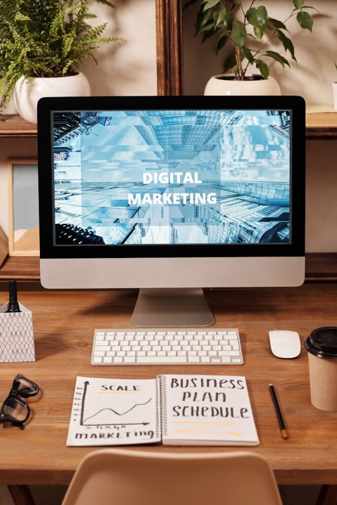 pexels-photo-6476808 Contemporary office setup featuring digital marketing strategy on a computer screen, ideal for business technology themes.